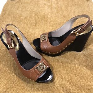 Camel brown MK heeled sandals trim with gold studs and side buckle strap.Size 7